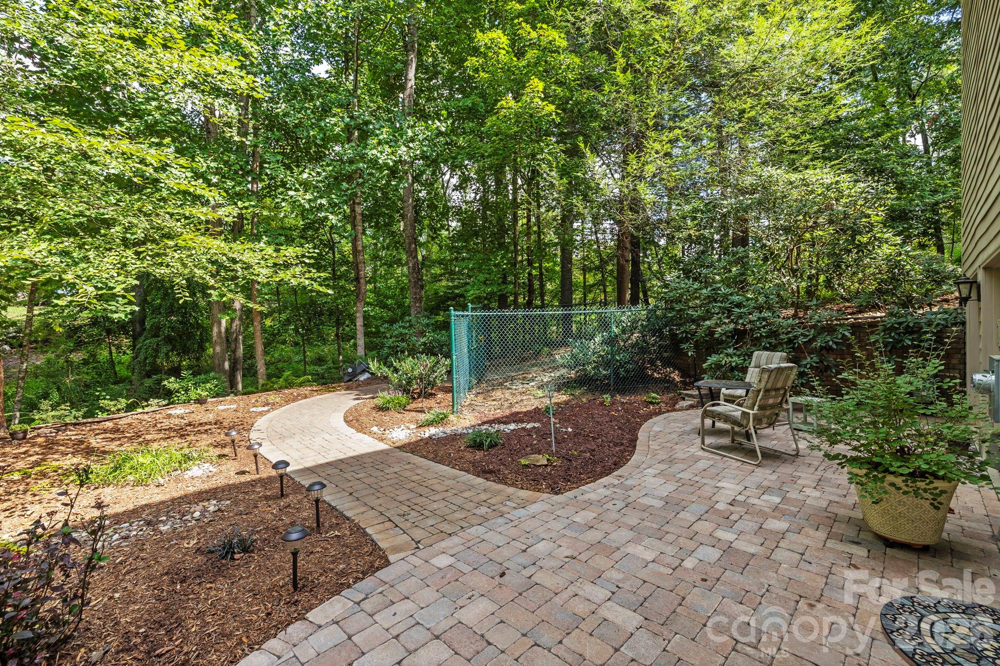 46 Beale Court Fletcher, NC 28732 - Photo 36 of 48 a view of a backyard with sitting area