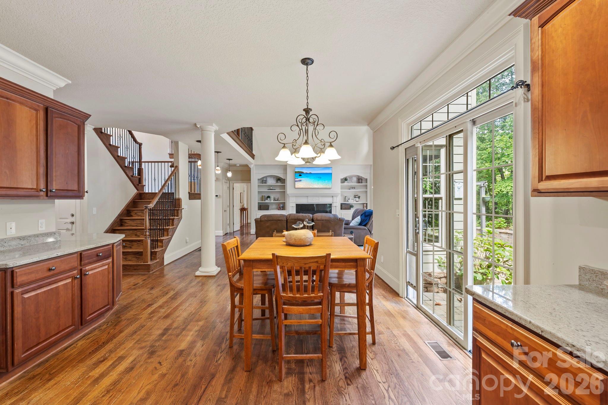 46 Beale Court Fletcher, NC 28732 - Photo 9 of 48 a view of a dining room with furniture window and wooden floor