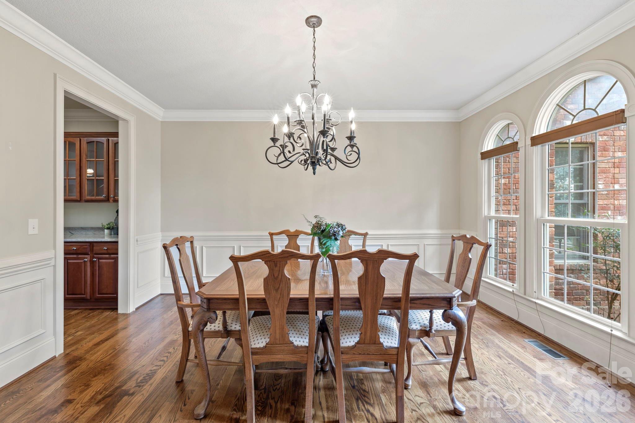 46 Beale Court Fletcher, NC 28732 - Photo 10 of 48 a view of a dining room with furniture wooden floor and chandelier