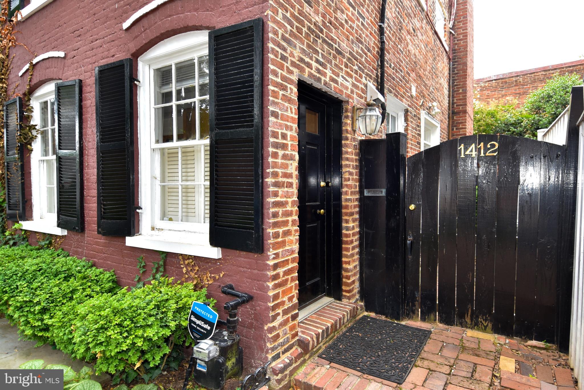1412 27th Street Northwest Washington, DC 20007 - Photo 28 of 28 a view of a house with a backyard