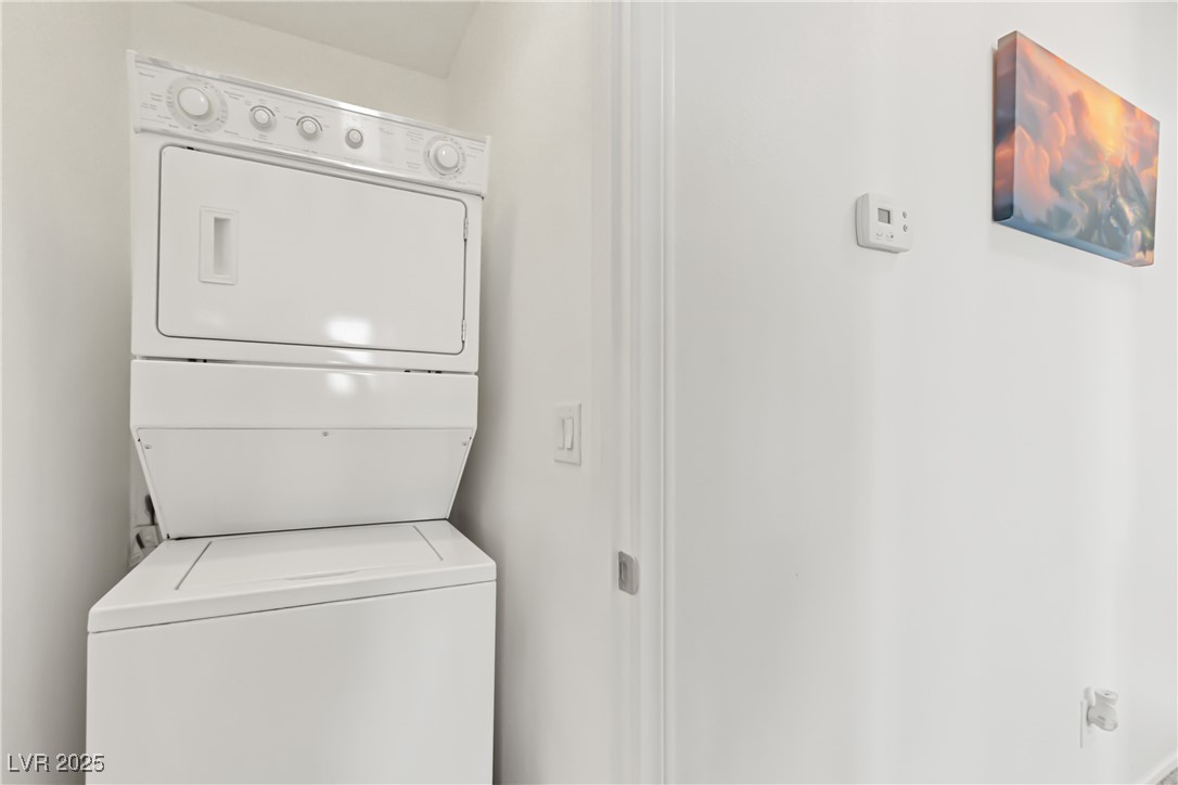 9105 Silk Threads Avenue Las Vegas, NV 89149 - Photo 21 of 25 Laundry area with stacked washer / drying machine