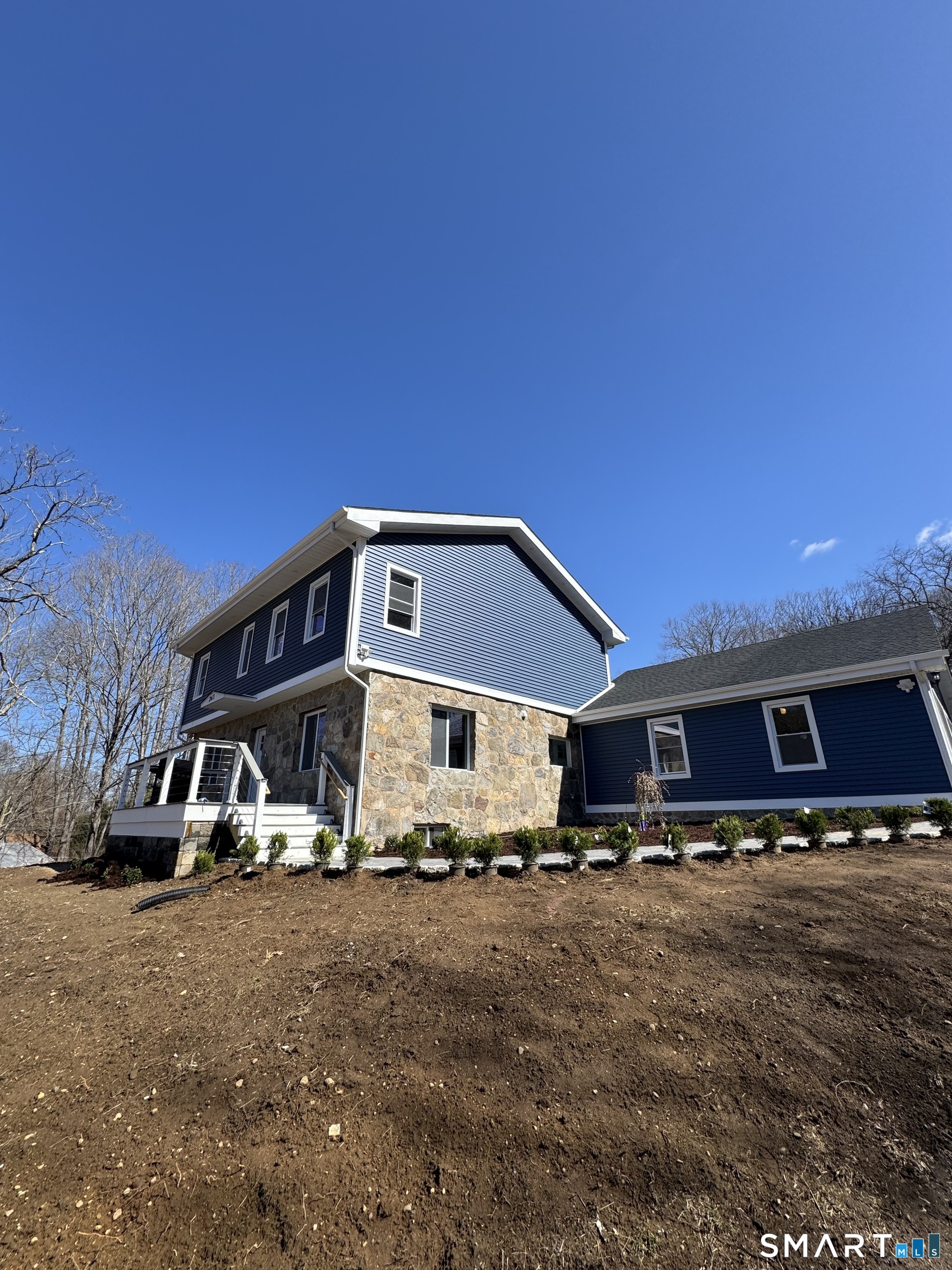 243 Long Hill Road Andover, CT 06232 - Photo 2 of 31 a front view of a house with a yard