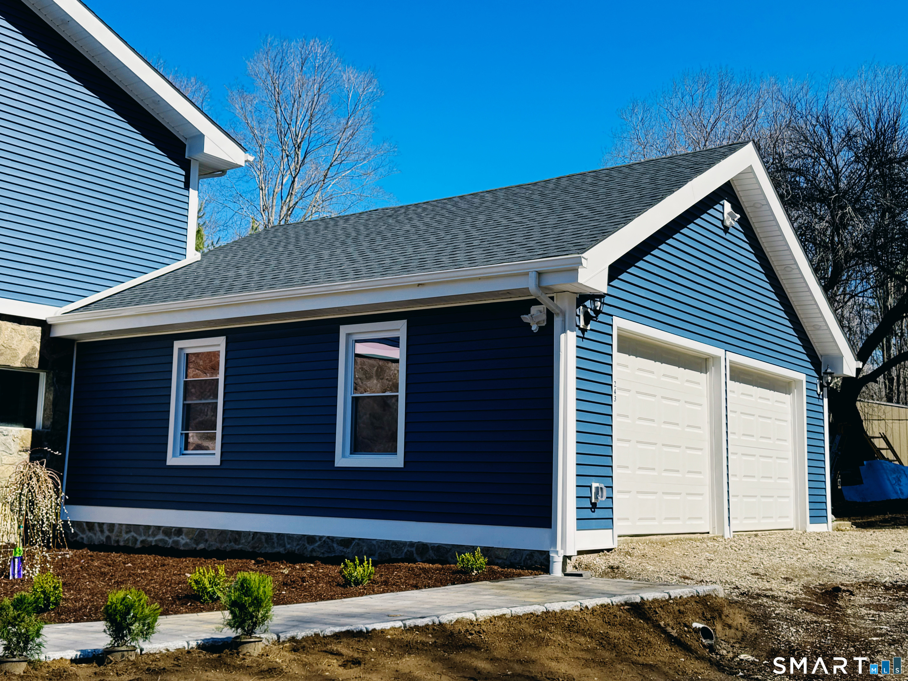 243 Long Hill Road Andover, CT 06232 - Photo 27 of 31 a front view of a house with a yard