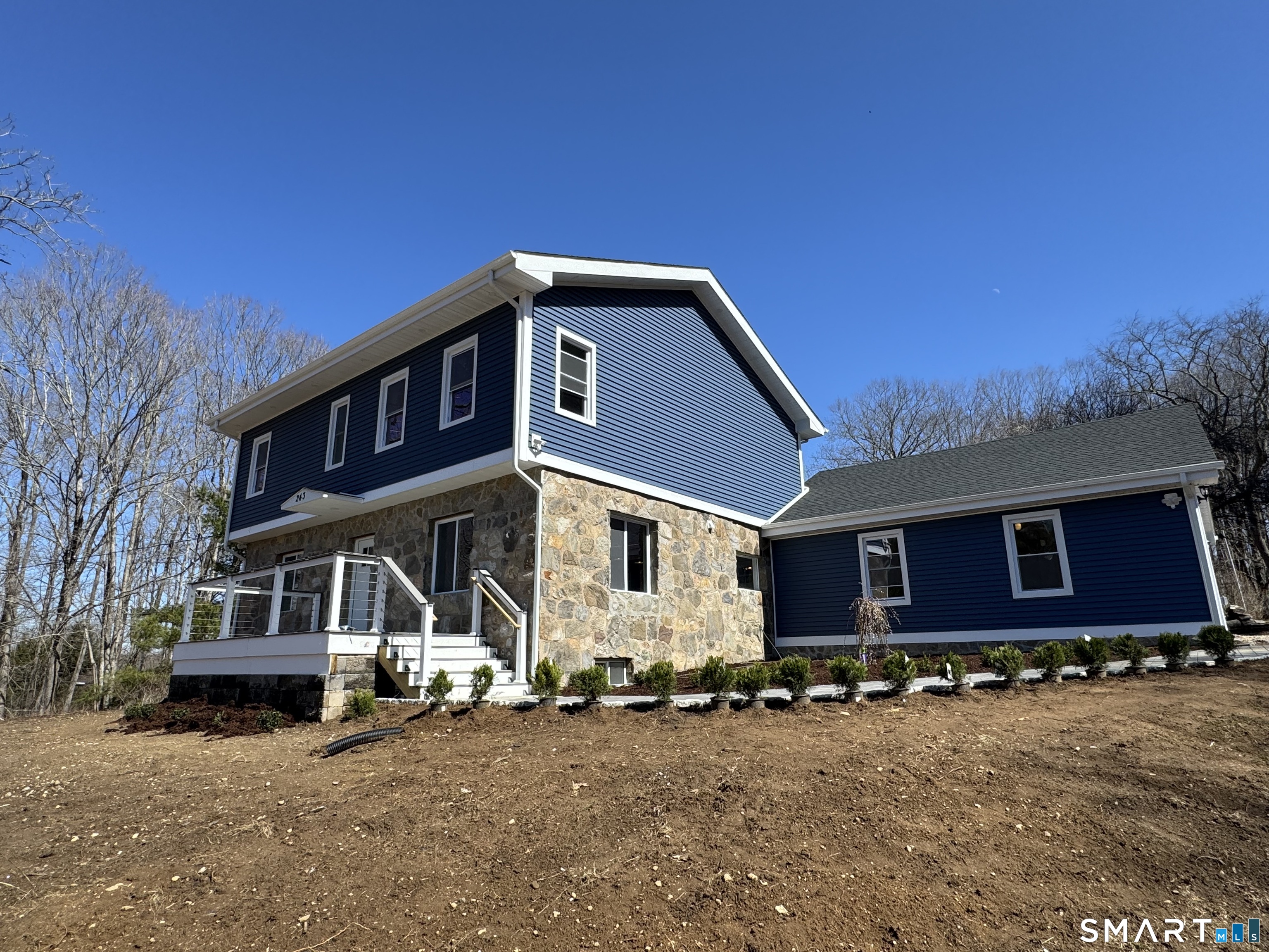 243 Long Hill Road Andover, CT 06232 - Photo 3 of 31 a front view of a house with a yard