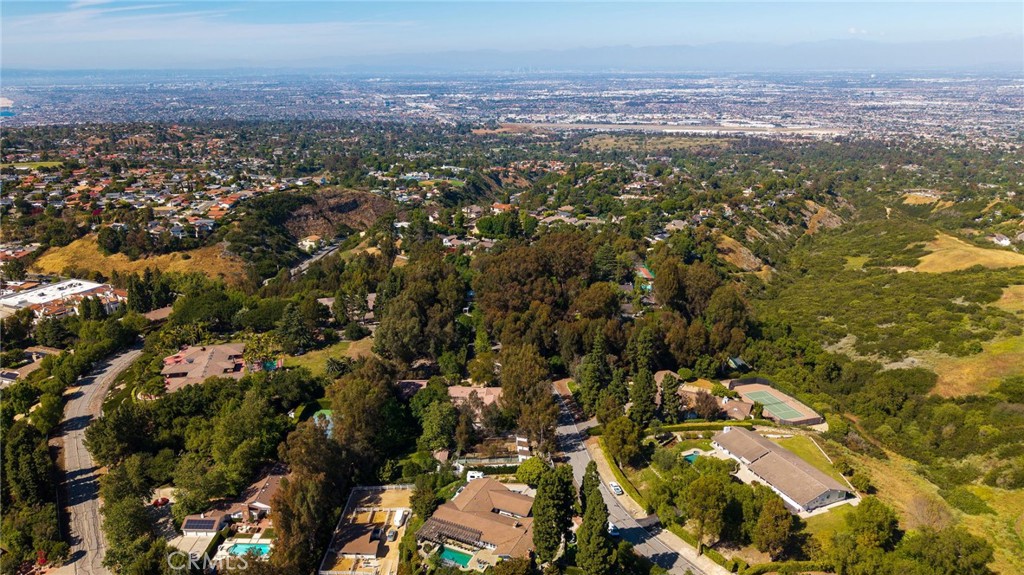 16 Johns Canyon Road Rolling Hills, CA 90274 - Photo 15 of 17 an aerial view of residential house with yard and mountain view in back