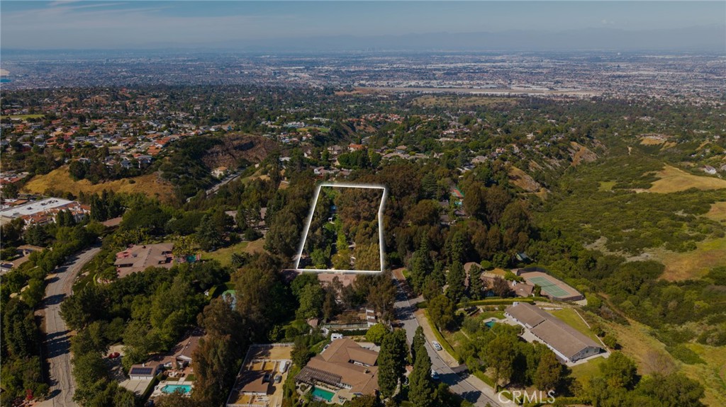 16 Johns Canyon Road Rolling Hills, CA 90274 - Photo 2 of 17 an aerial view of a house with a mountain