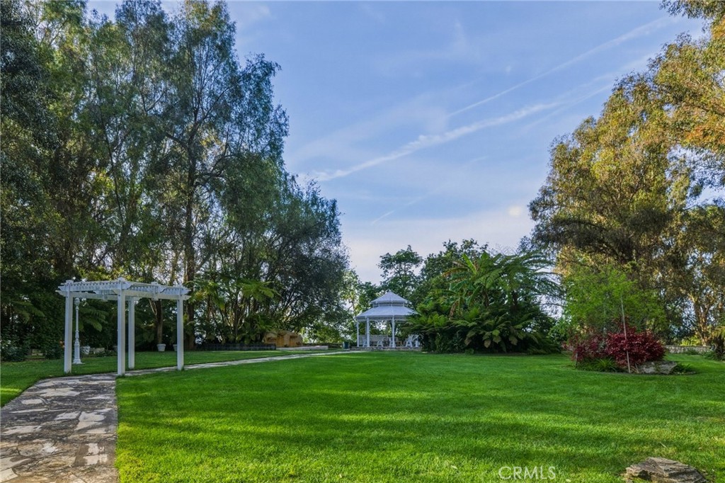 16 Johns Canyon Road Rolling Hills, CA 90274 - Photo 10 of 17 a view of a big yard with plants and large trees