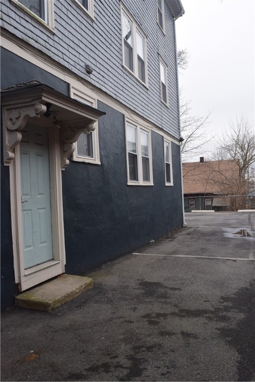186 Camp Street, Unit 5 Providence, RI 02906 - Photo 22 of 24 assigned side of building parking and side entrance