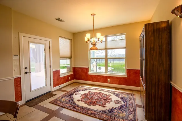 a living room with large window