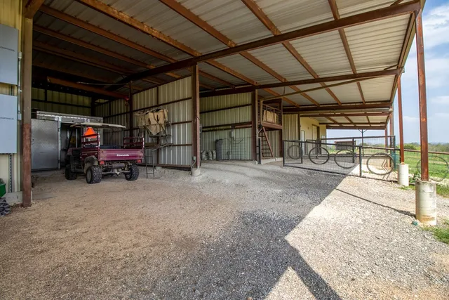 a view of a room with wooden walls