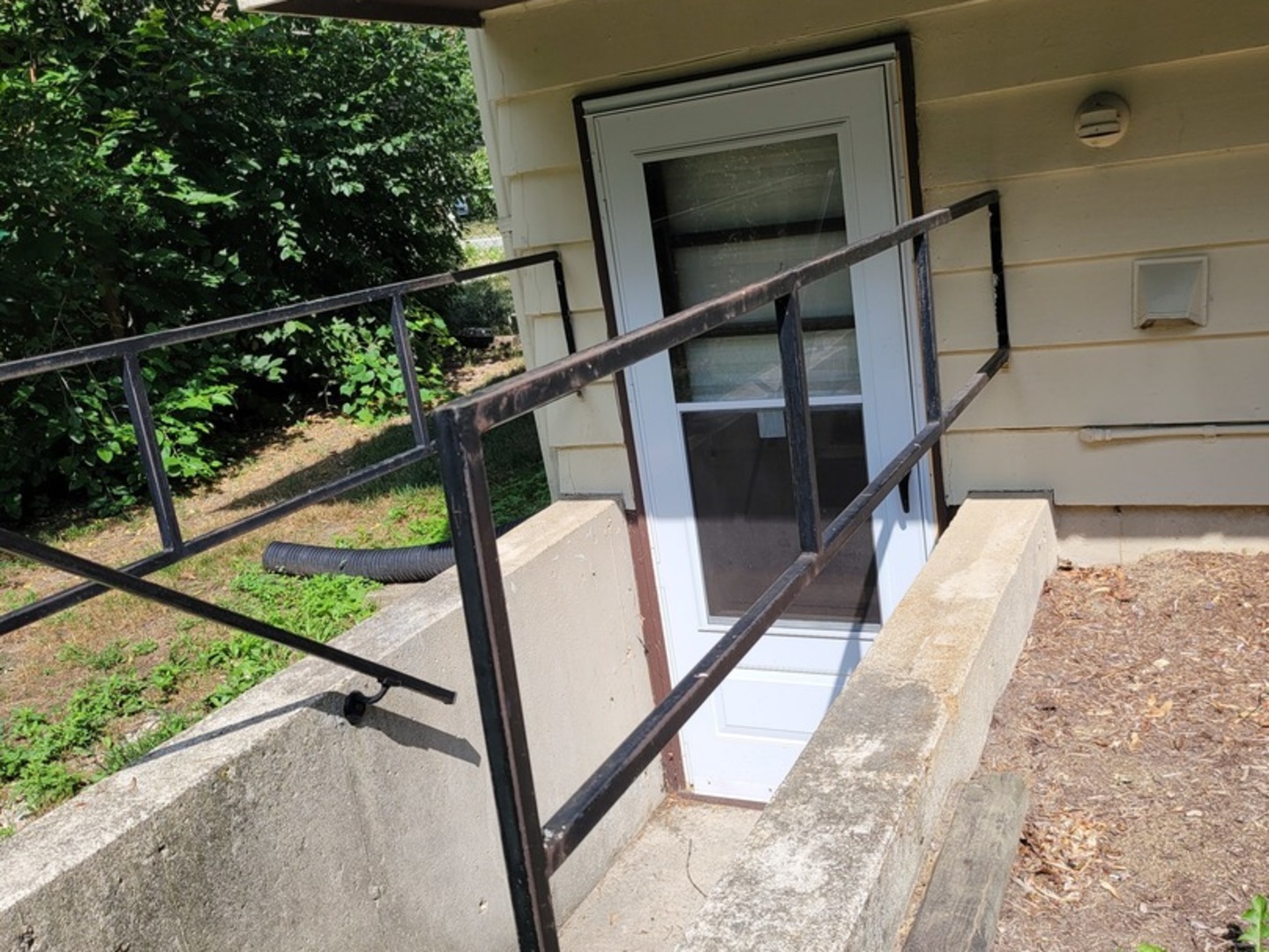 532 Northgate Road Lindenhurst, IL 60046 - Photo 3 of 4 a view of balcony with wooden floor and stairs