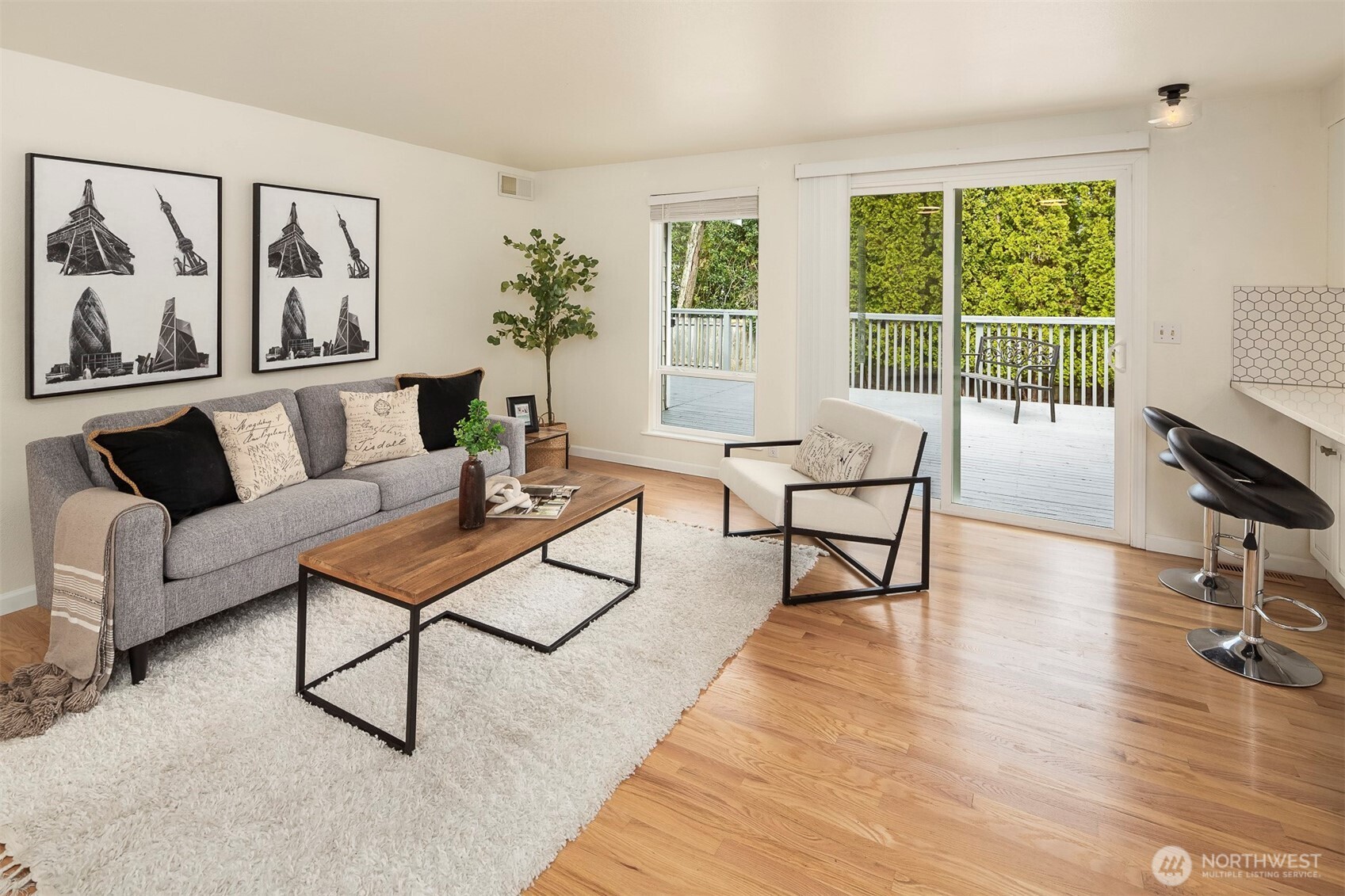 2413 166th Place Southeast Bothell, WA 98012 - Photo 14 of 32 a living room with furniture and a floor to ceiling window