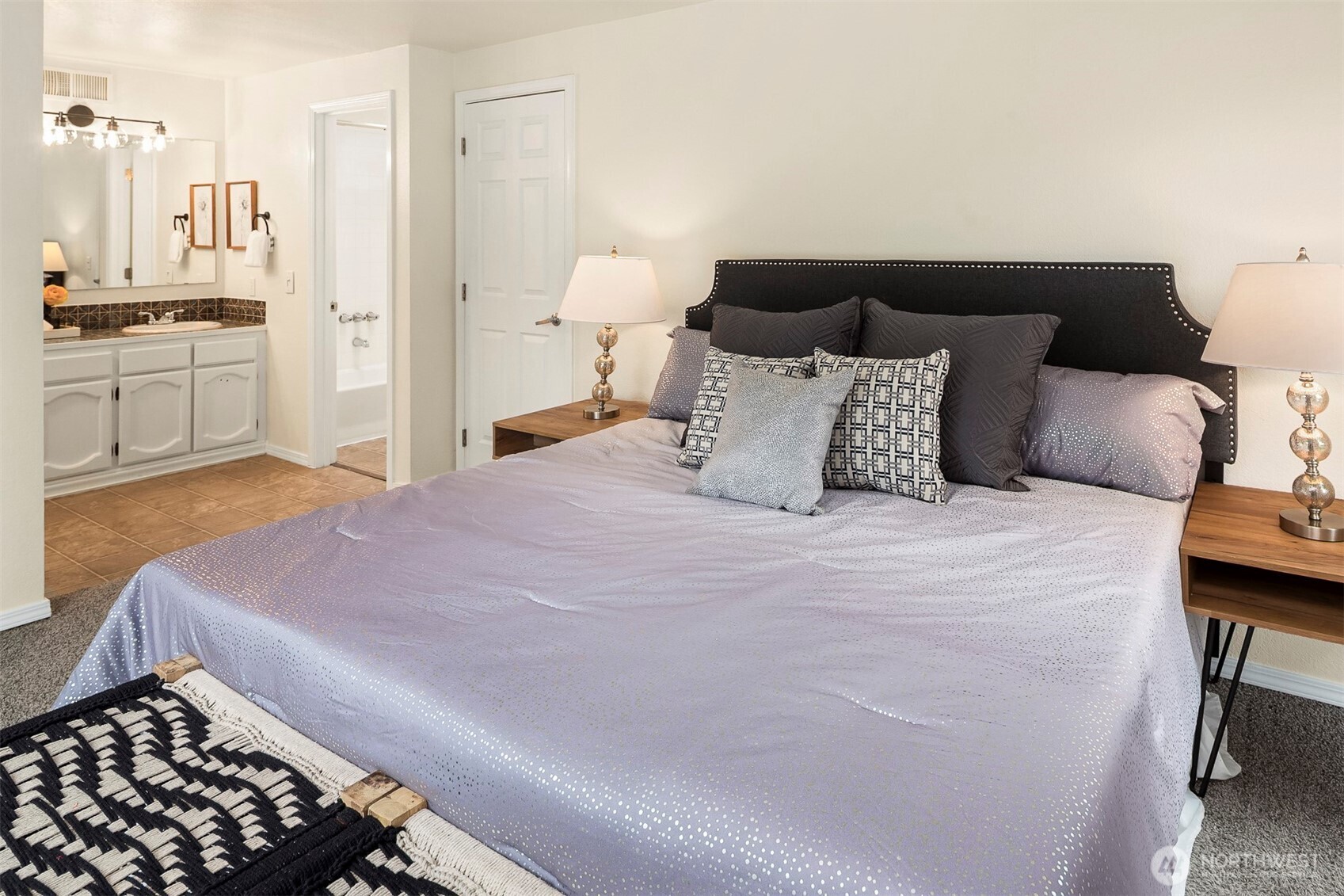 2413 166th Place Southeast Bothell, WA 98012 - Photo 17 of 32 a bedroom with a bed and a view of kitchen