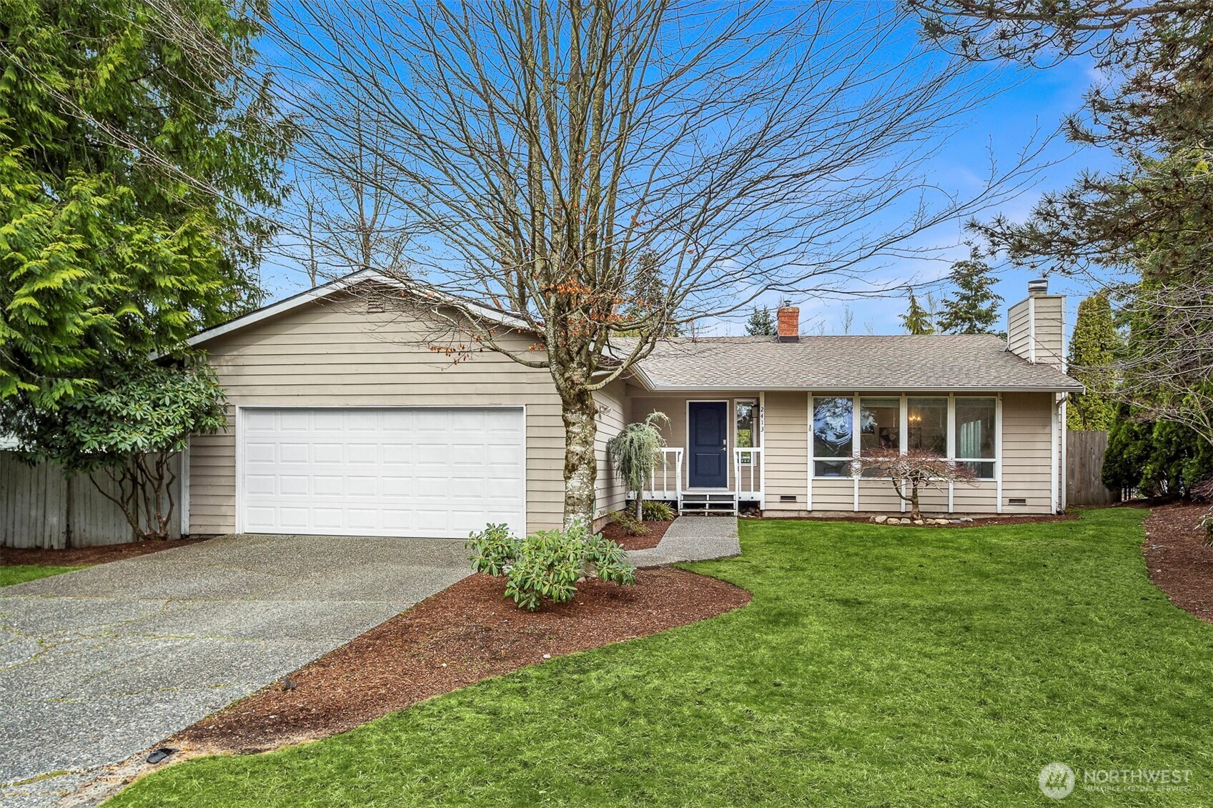 2413 166th Place Southeast Bothell, WA 98012 - Photo 32 of 32 front view of a house with a yard