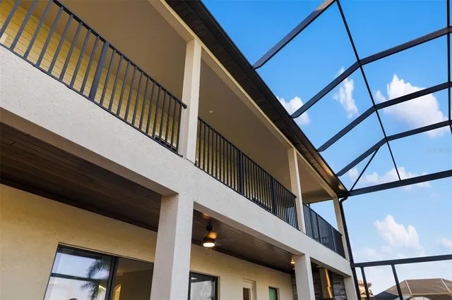 a kitchen with kitchen island cabinets and refrigerator