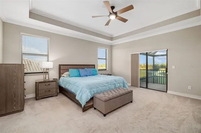 an aerial view of a house with a ocean view