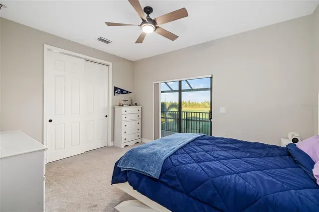 an aerial view of a house with a swimming pool