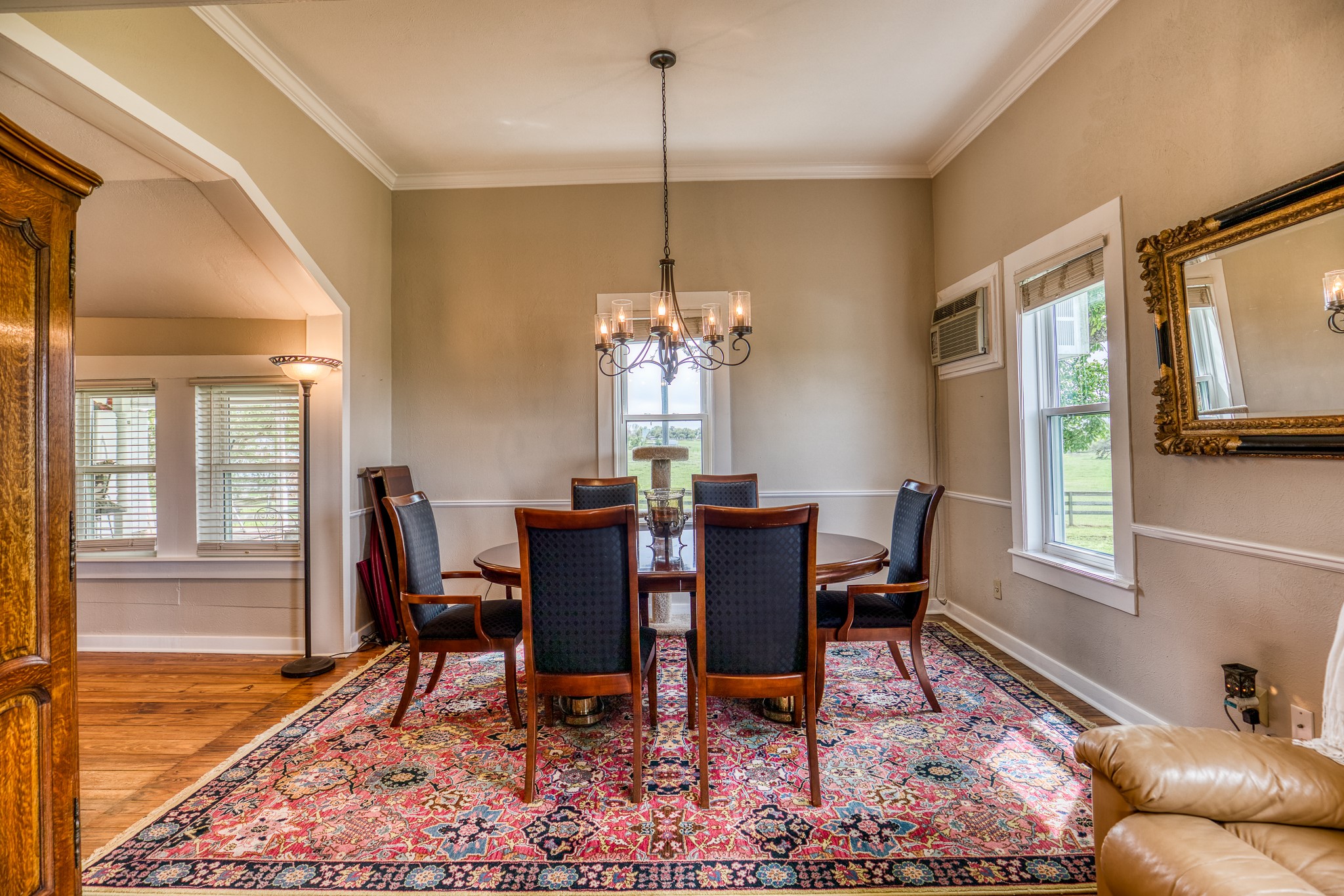 20751 Fm 1155 Street East Washington, TX 77880 - Photo 12 of 49 a view of a dining room with furniture window and wooden floor