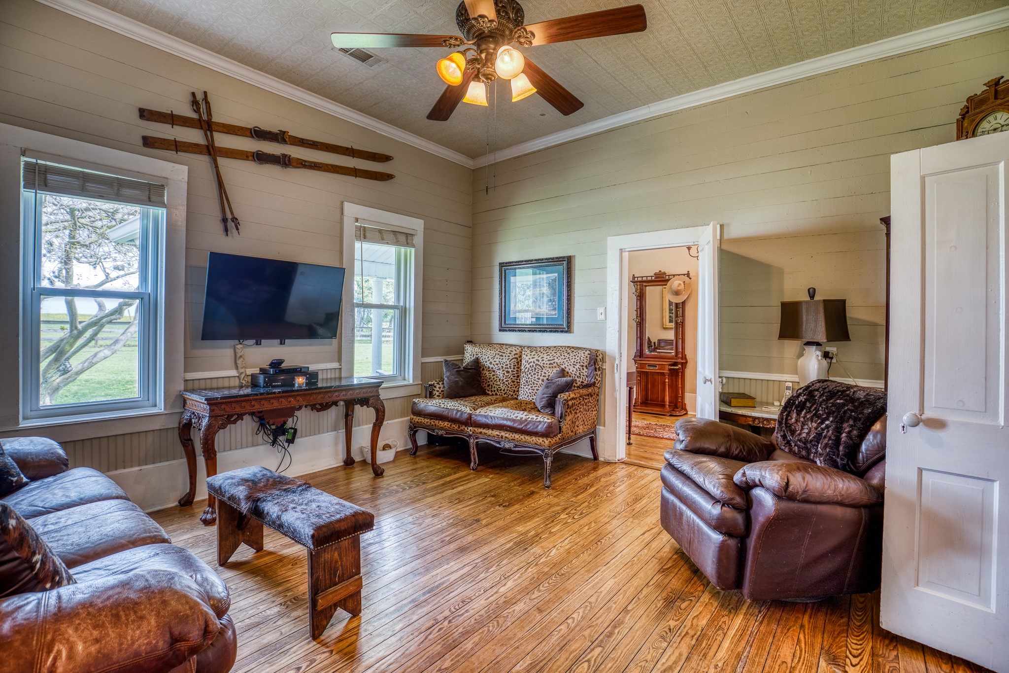 20751 Fm 1155 Street East Washington, TX 77880 - Photo 13 of 49 a living room with furniture and a flat screen tv
