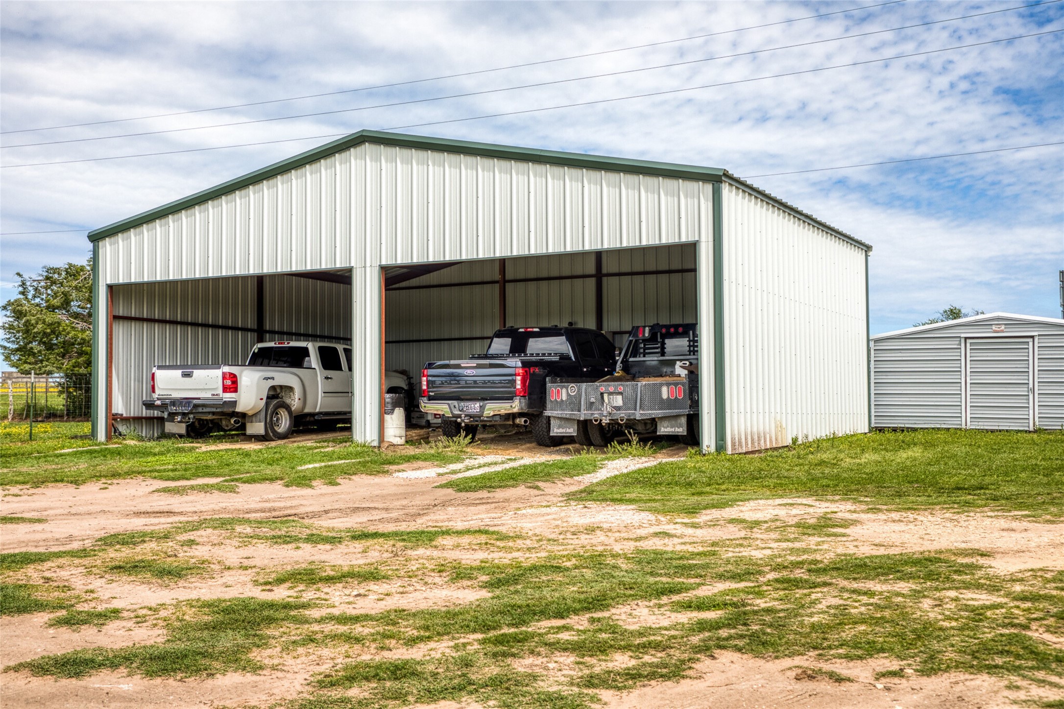 20751 Fm 1155 Street East Washington, TX 77880 - Photo 23 of 49 a view of a house with backyard porch and furniture