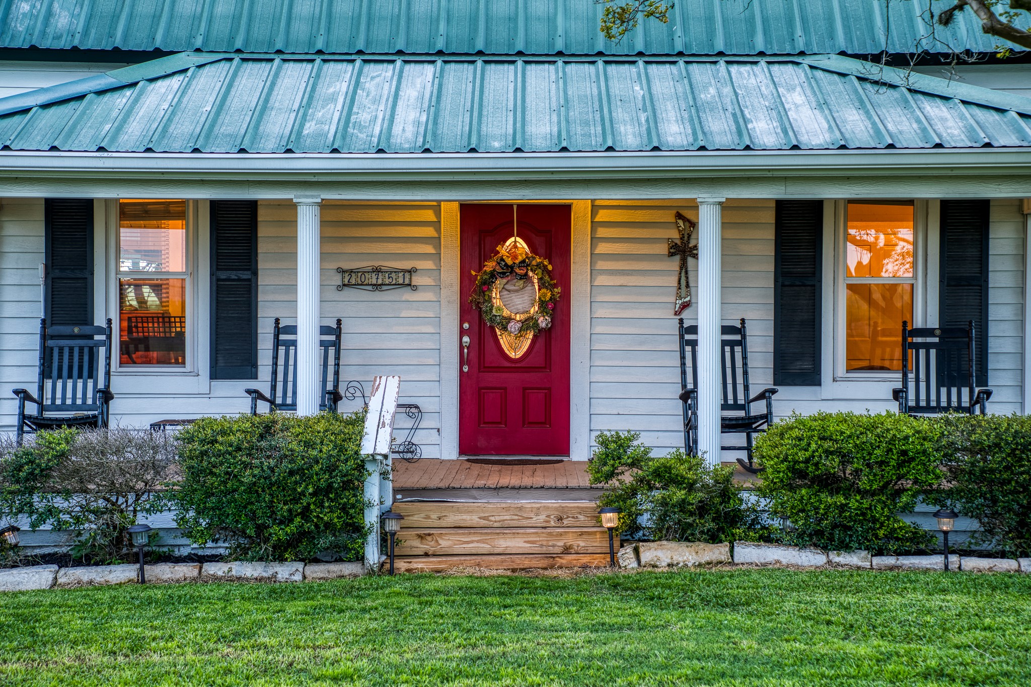 20751 Fm 1155 Street East Washington, TX 77880 - Photo 5 of 49 a front view of a house with garden
