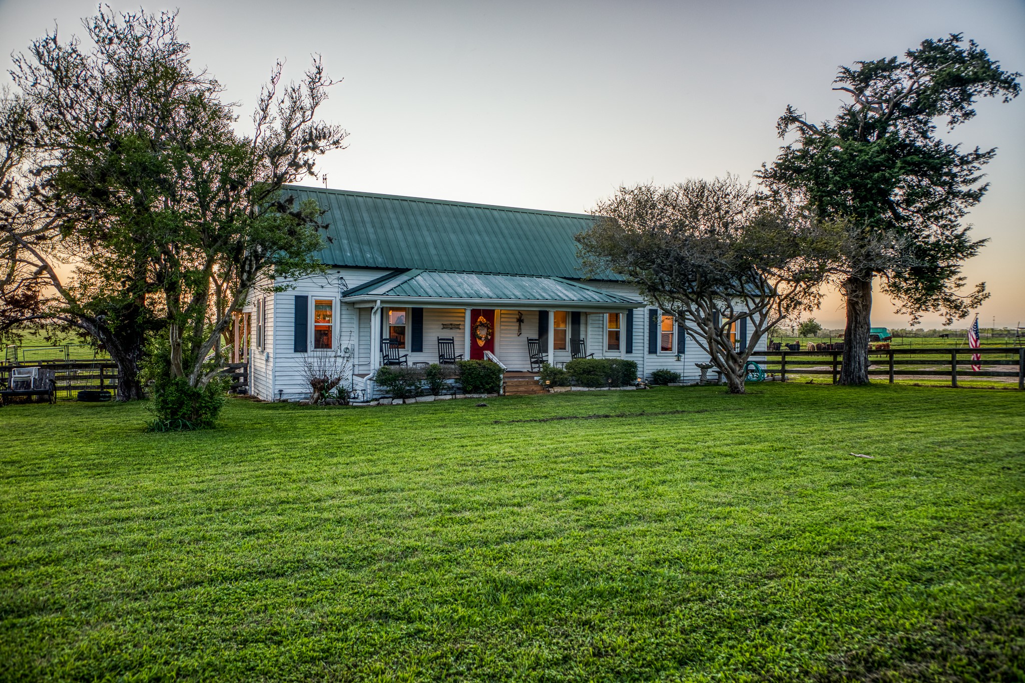 20751 Fm 1155 Street East Washington, TX 77880 - Photo 7 of 49 a front view of a house with a garden