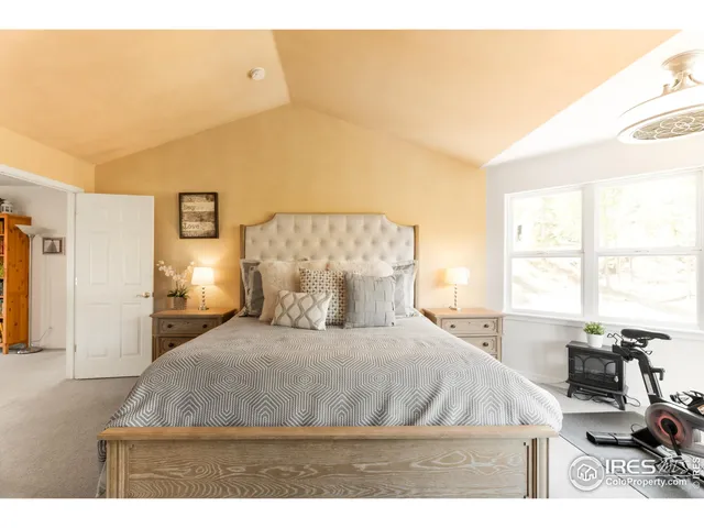 a room with furniture pool table and flat screen tv
