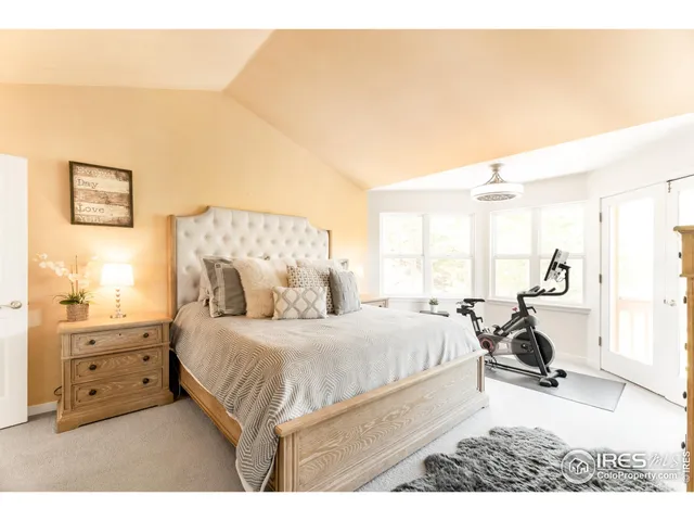 a room with pool table and outdoor view