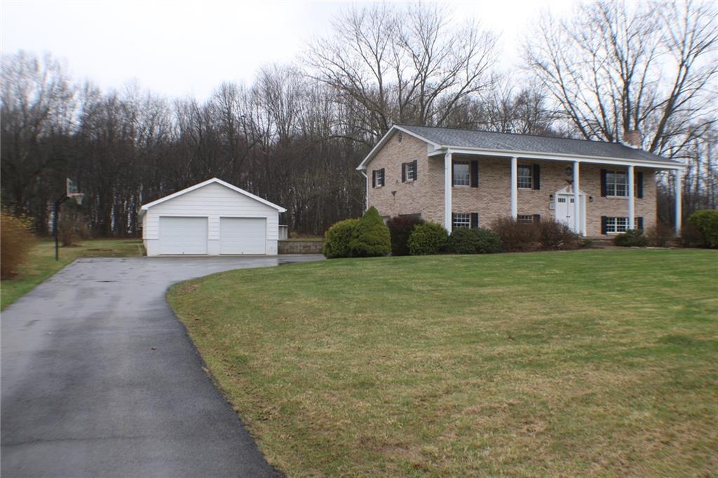 626 Ekastown Road Sarver, PA 16055 - Photo 2 of 50 The paved driveway leads you to the detached garage or the integral garage.