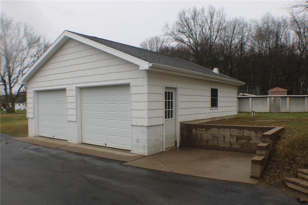 626 Ekastown Road Sarver, PA 16055 - Photo 39 of 50 a front view of house with yard and trees in the background