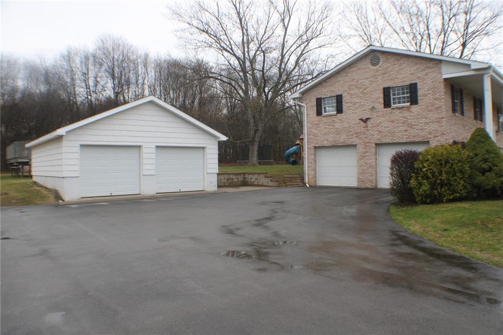 626 Ekastown Road Sarver, PA 16055 - Photo 45 of 50 a view of a house with a yard and garage