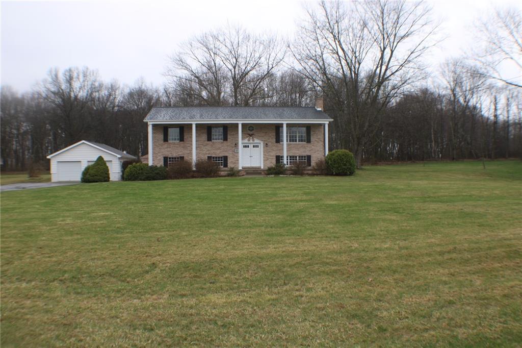 626 Ekastown Road Sarver, PA 16055 - Photo 48 of 50 a front view of a house with a garden