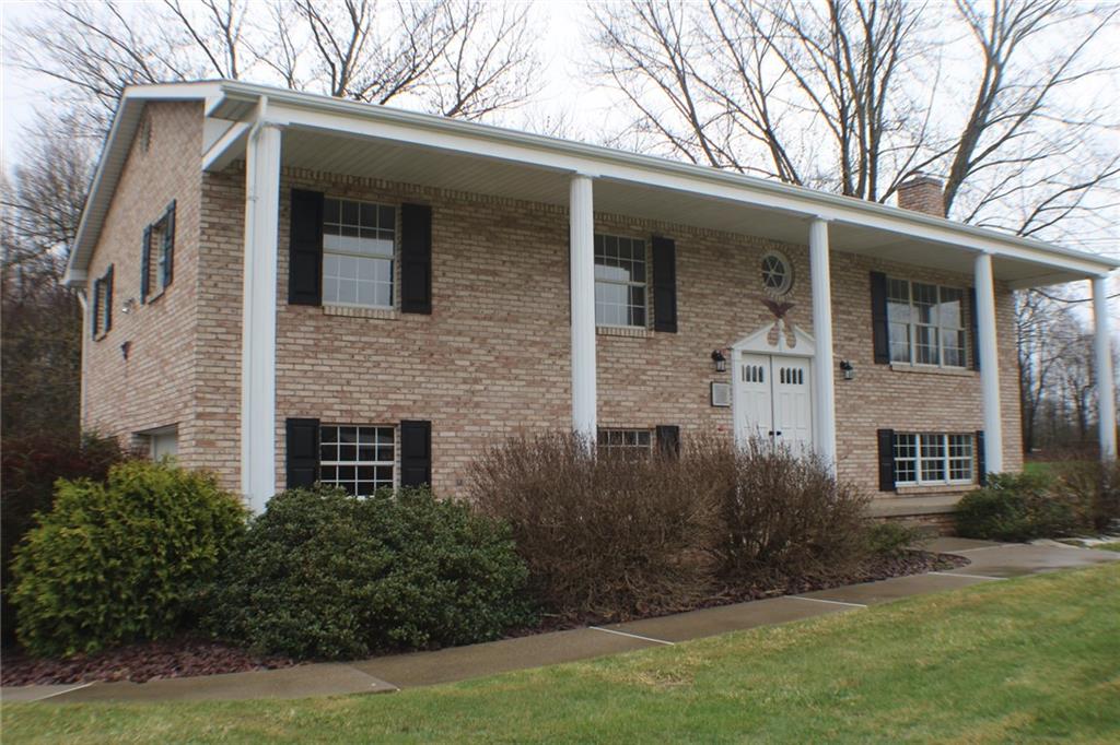 626 Ekastown Road Sarver, PA 16055 - Photo 50 of 50 a view of a white house next to a yard with big trees