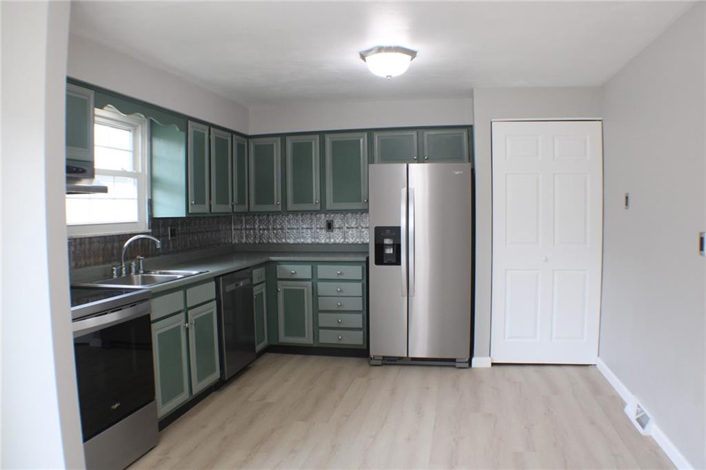 626 Ekastown Road Sarver, PA 16055 - Photo 5 of 50 a kitchen with stainless steel appliances granite countertop a refrigerator and a sink