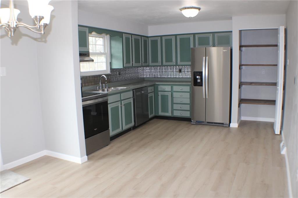 626 Ekastown Road Sarver, PA 16055 - Photo 6 of 50 a kitchen with stainless steel appliances granite countertop a refrigerator and a sink