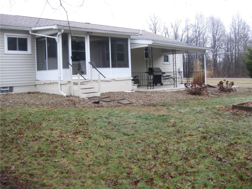 8352 Lamor Road Mercer, PA 16137 - Photo 23 of 23 Screened in back porch along with patio...just sit back and relax!