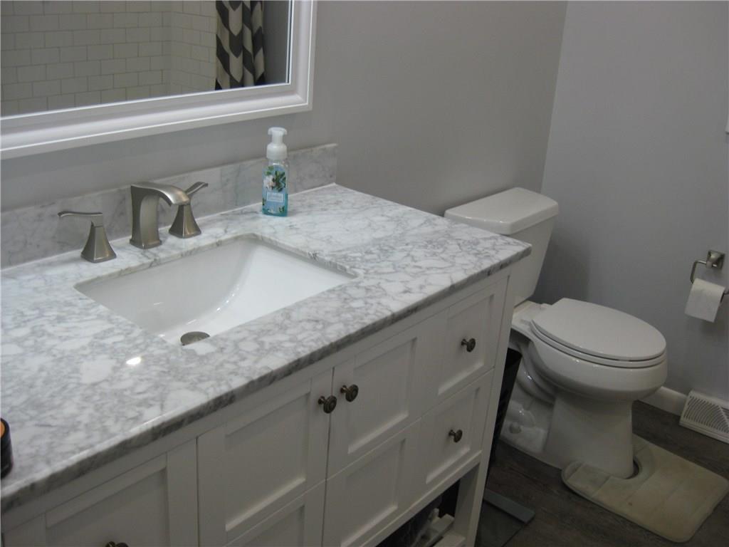 8352 Lamor Road Mercer, PA 16137 - Photo 6 of 23 New flooring, sink and toilet; all new!