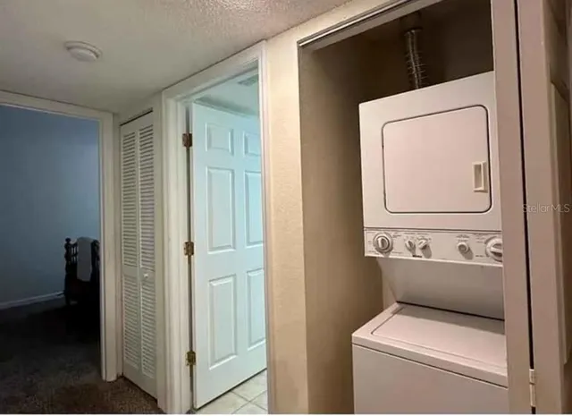 a view of a balcony with a potted plants