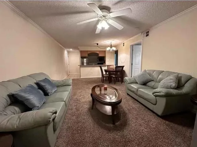 a view of a livingroom and dining room