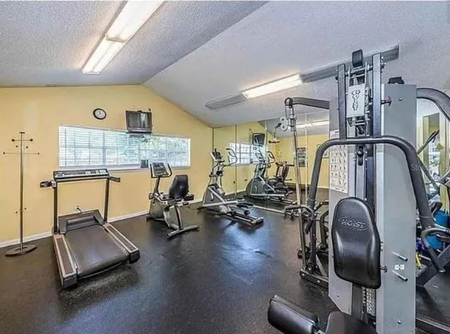 a view of a room with gym equipment