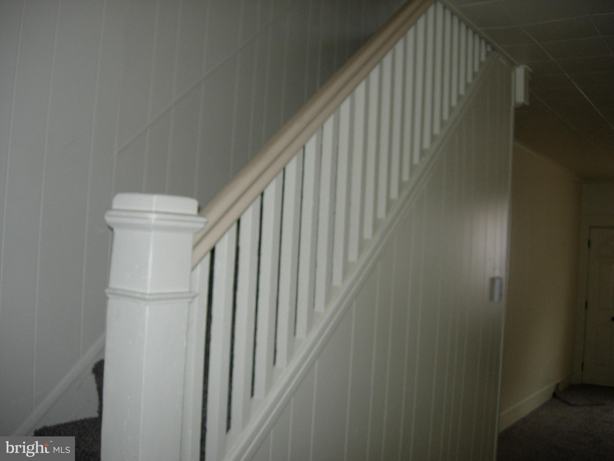 628 Locust Street Reading, PA 19604 - Photo 9 of 25 staircase to 2nd floor
