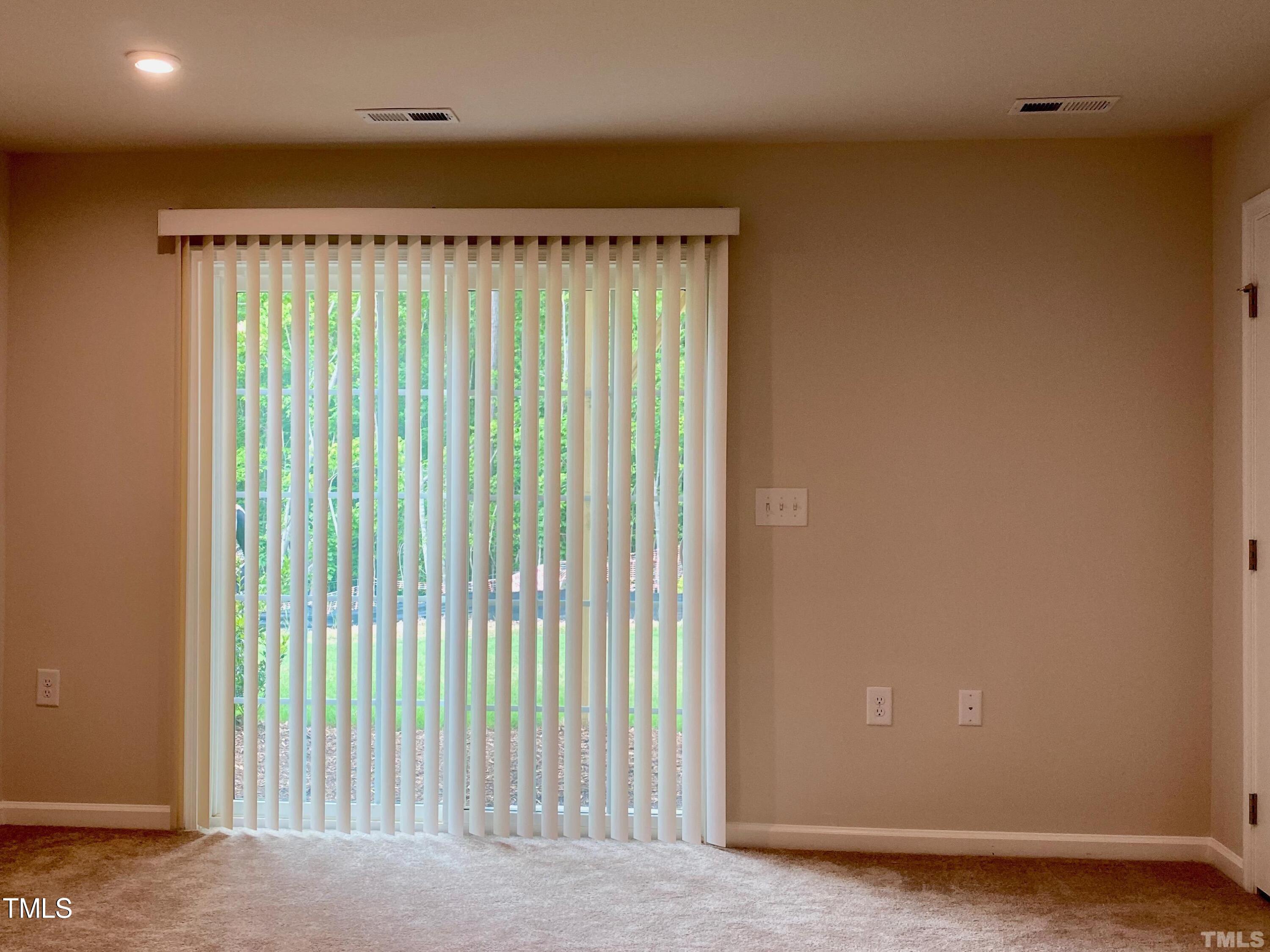 6627 Pathfinder Way Raleigh, NC 27616 - Photo 17 of 35 a view of a black and white wall
