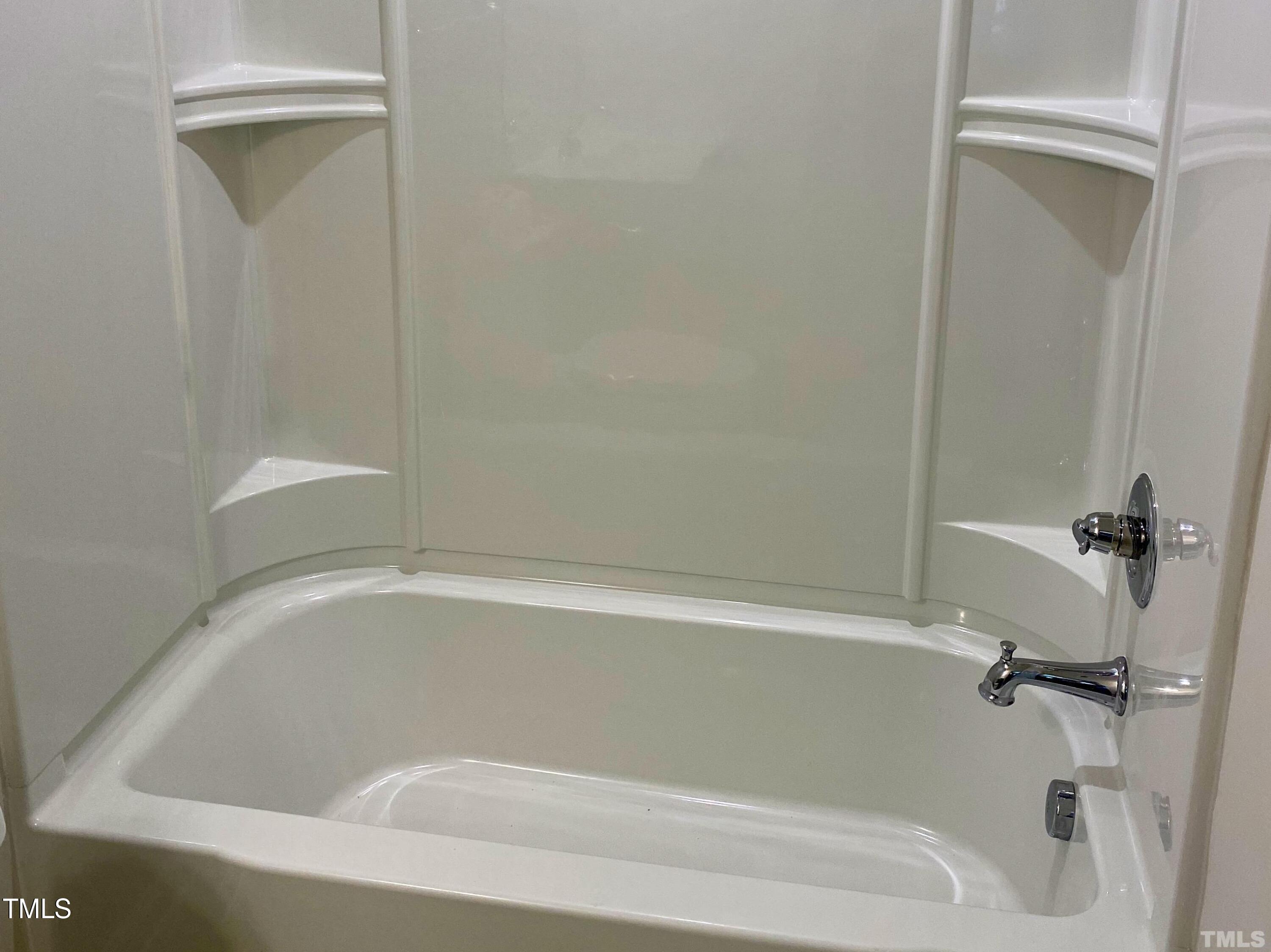 6627 Pathfinder Way Raleigh, NC 27616 - Photo 19 of 35 a close view of a bathtub in bathroom