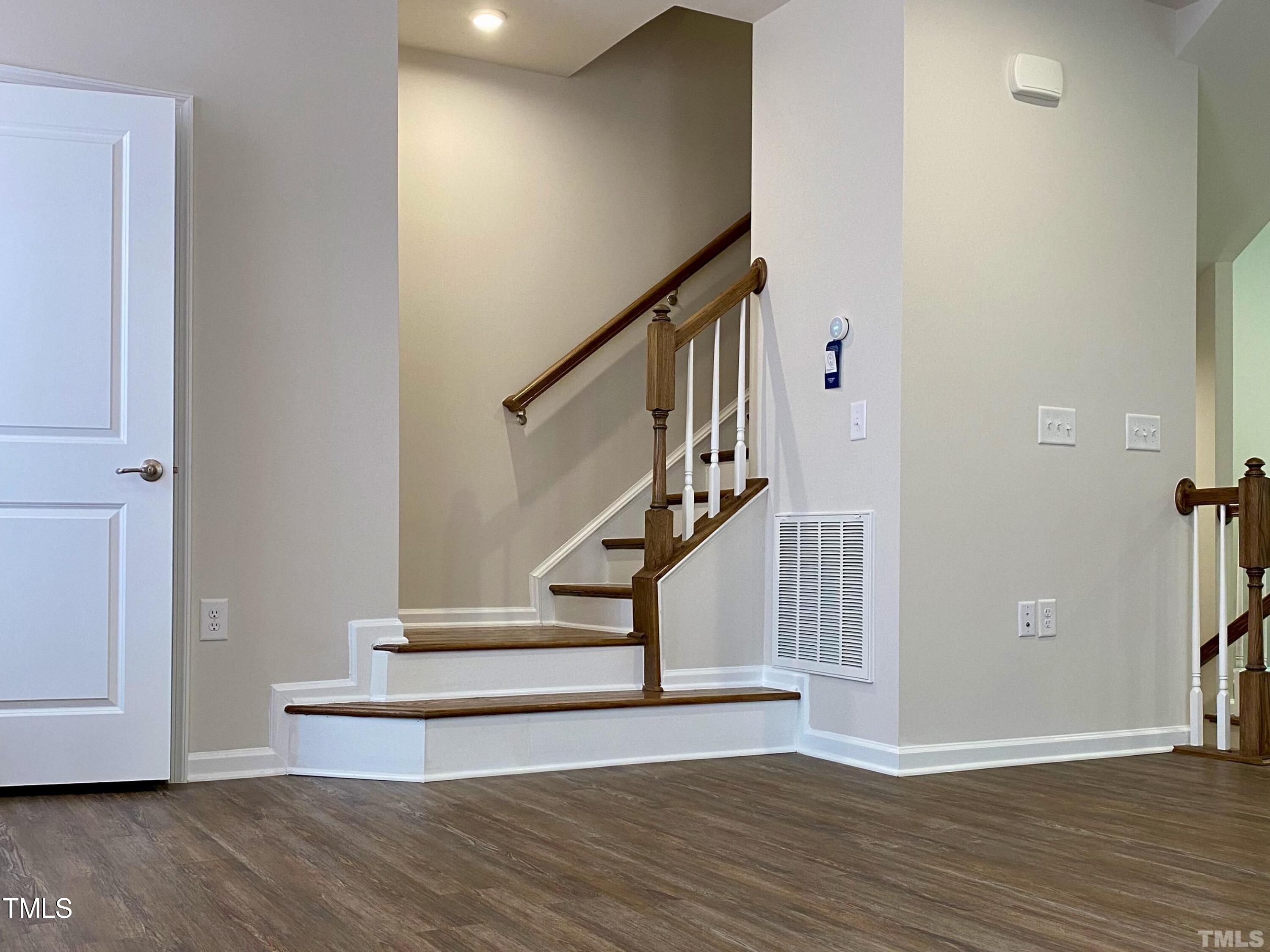 6627 Pathfinder Way Raleigh, NC 27616 - Photo 22 of 35 a view of entryway with wooden floor
