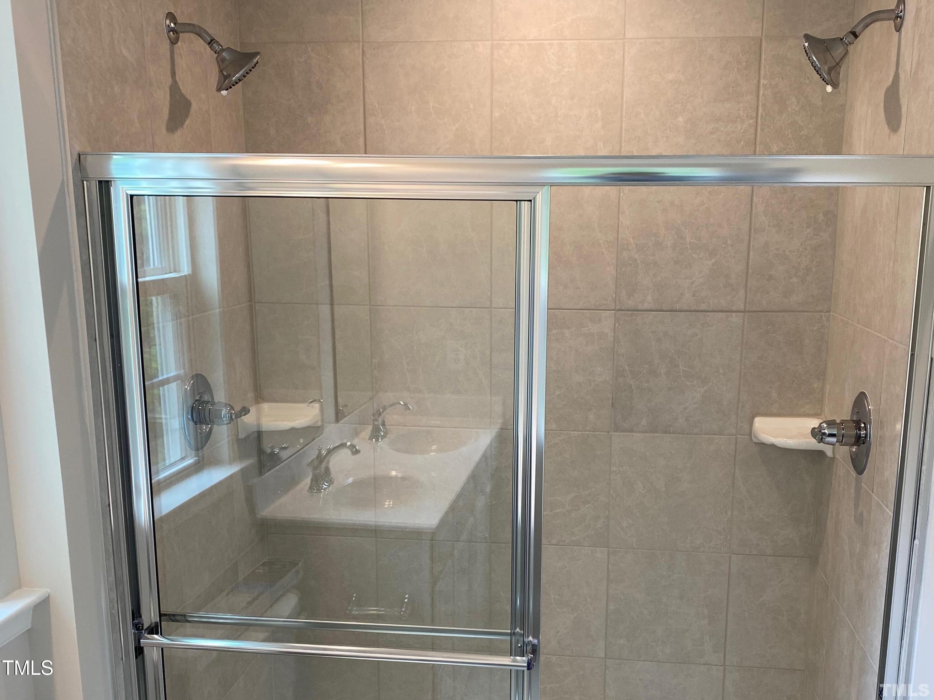 6627 Pathfinder Way Raleigh, NC 27616 - Photo 27 of 35 a bathroom with a shower