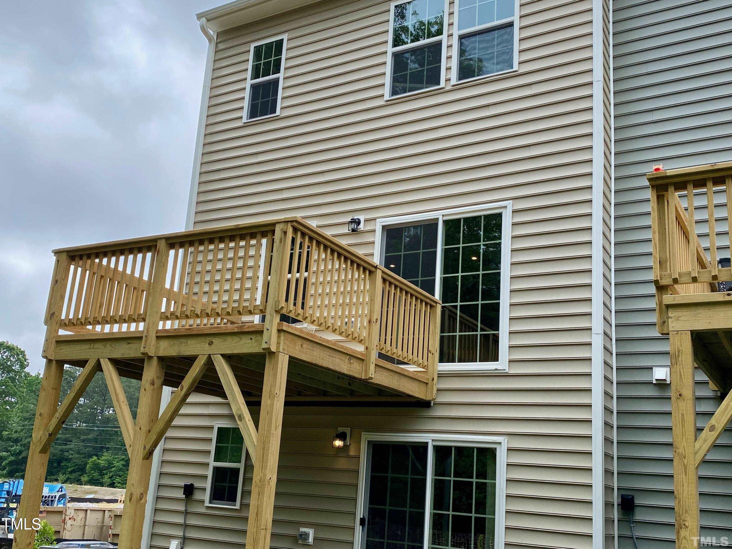 6627 Pathfinder Way Raleigh, NC 27616 - Photo 3 of 35 a view of a house with a deck
