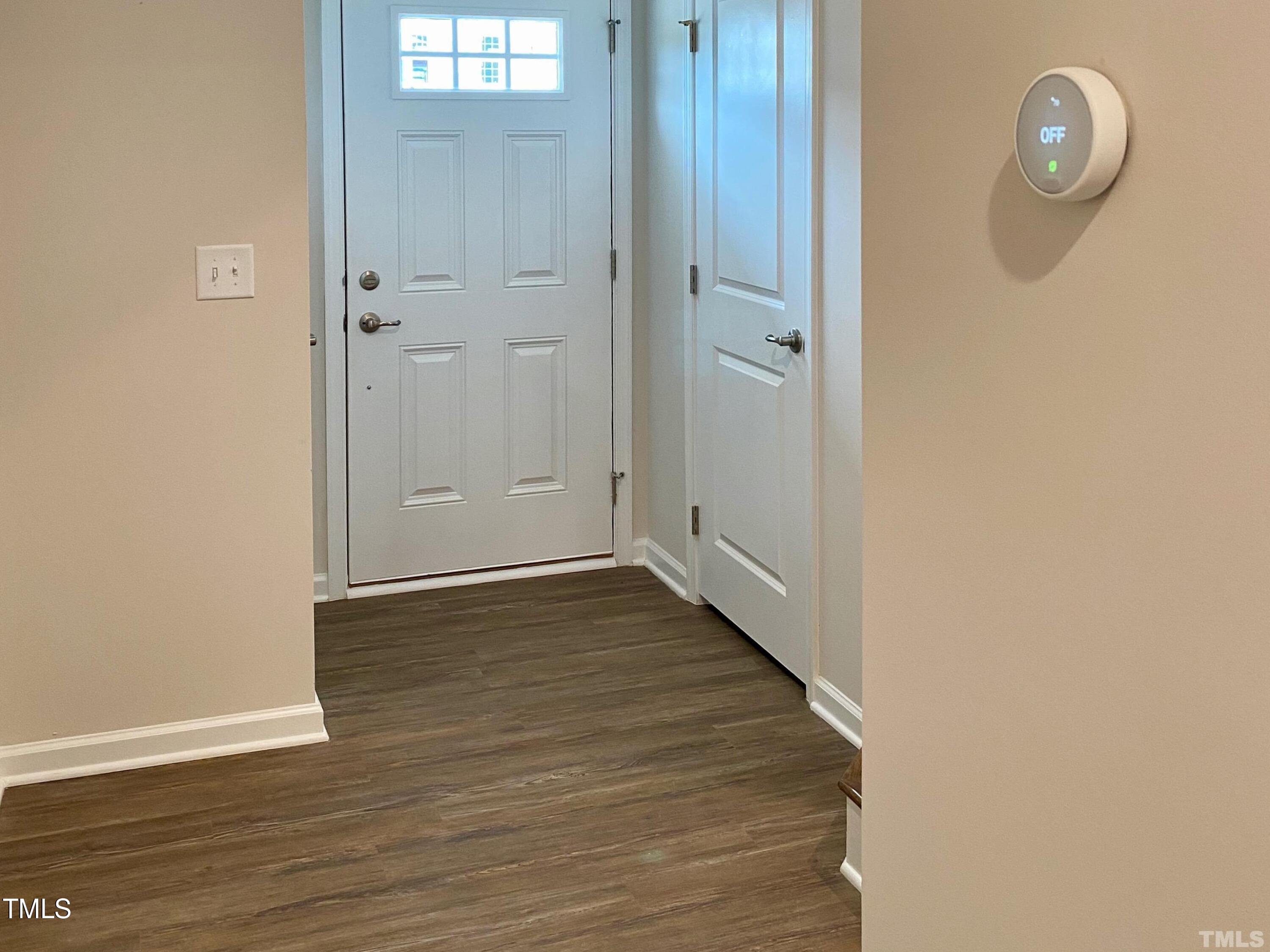 6627 Pathfinder Way Raleigh, NC 27616 - Photo 4 of 35 a view of a room with wooden floor