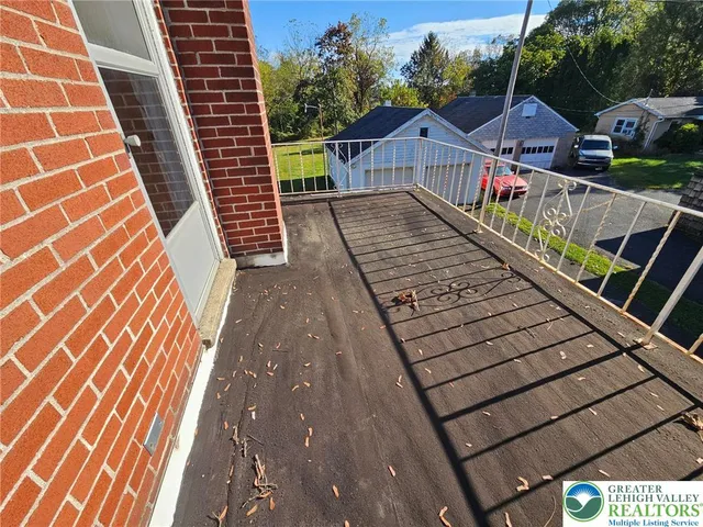 a view of wooden balcony with outdoor space