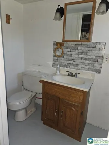 a bathroom with a sink and a toilet