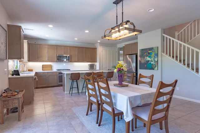 a view of a dining room with furniture